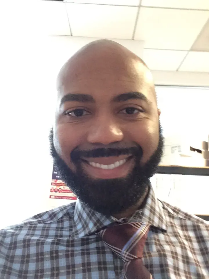 A smiling selfie at work