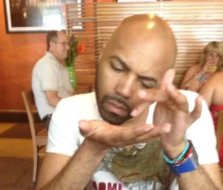 Blowing a kiss across the table